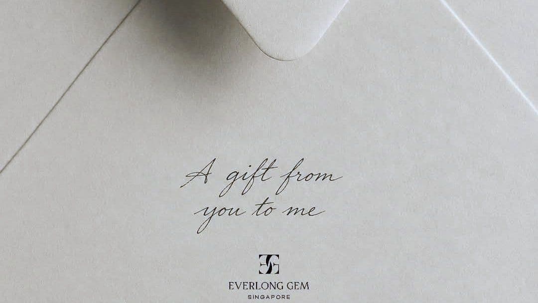An embossed Everlong Gem envelope, addressed as a gift